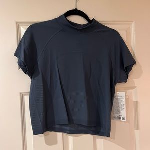 Swiftly high neck top